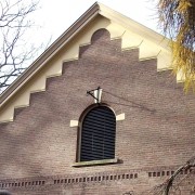 Ventilatierooster / Buitenluchtrooster in gevel. Ronde bovenkant